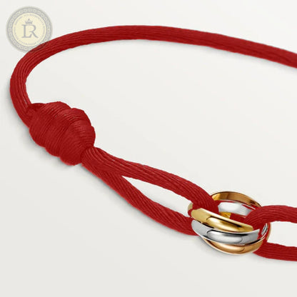 Bracelet Cartier Trinity, Cordon rouge