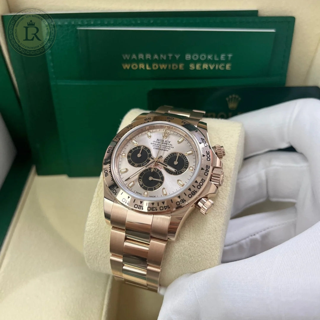 Rolex Cosmograph Daytona, or rose, cadran Sundust et index