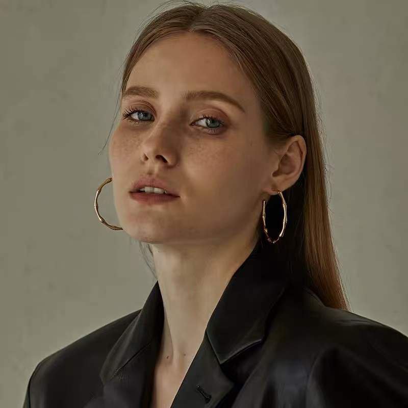 Boucles d'oreilles acier doré GUCCI