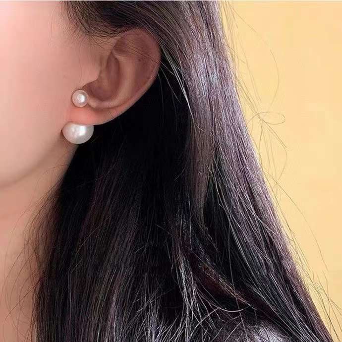 Boucles d'oreilles DIOR double perles