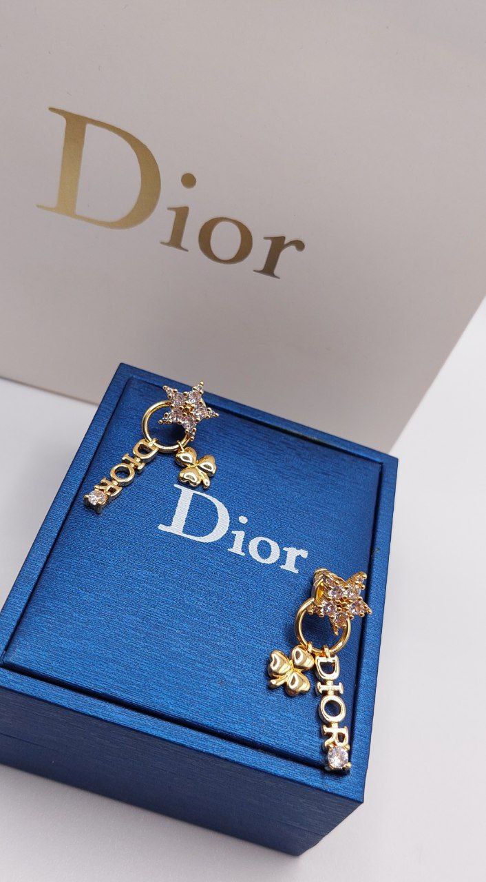 Boucles d'oreilles doré DIOR la star