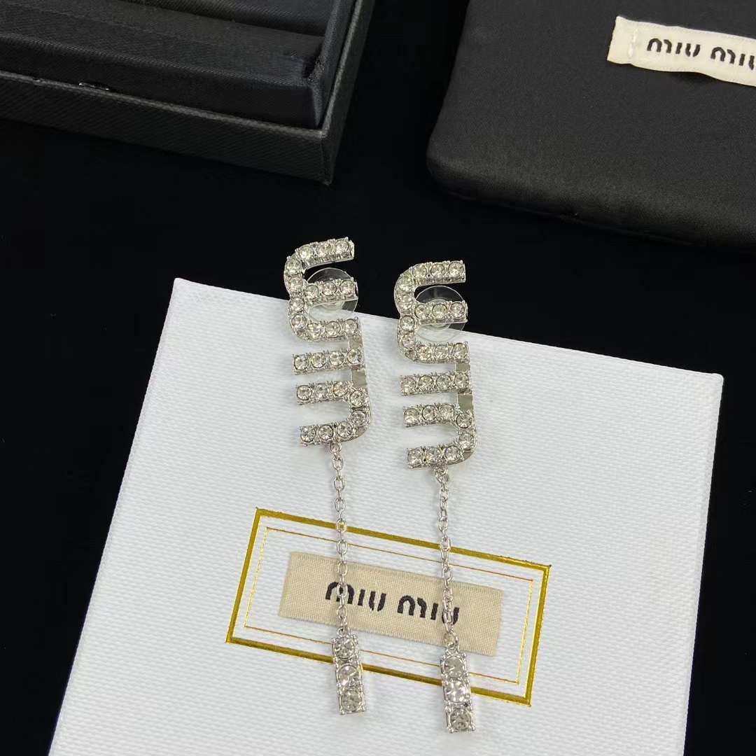 Boucles d'oreilles Argenté MIU MIU strass