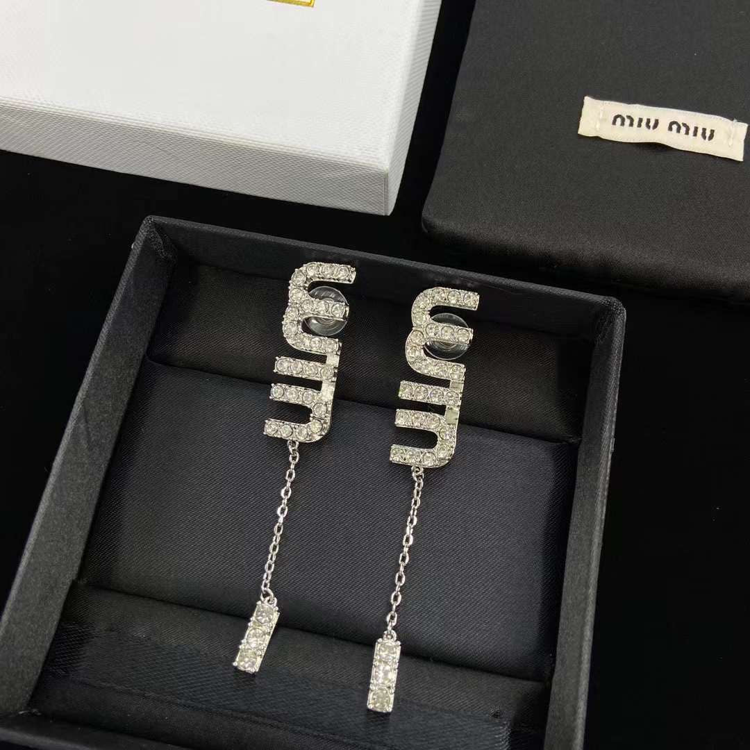 Boucles d'oreilles Argenté MIU MIU strass